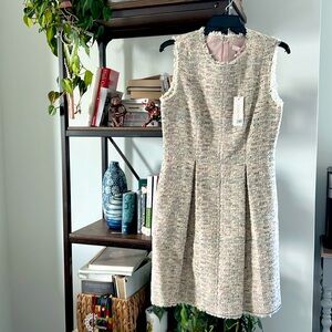 Lovely tweed A-line dress in white and multi. NYT.